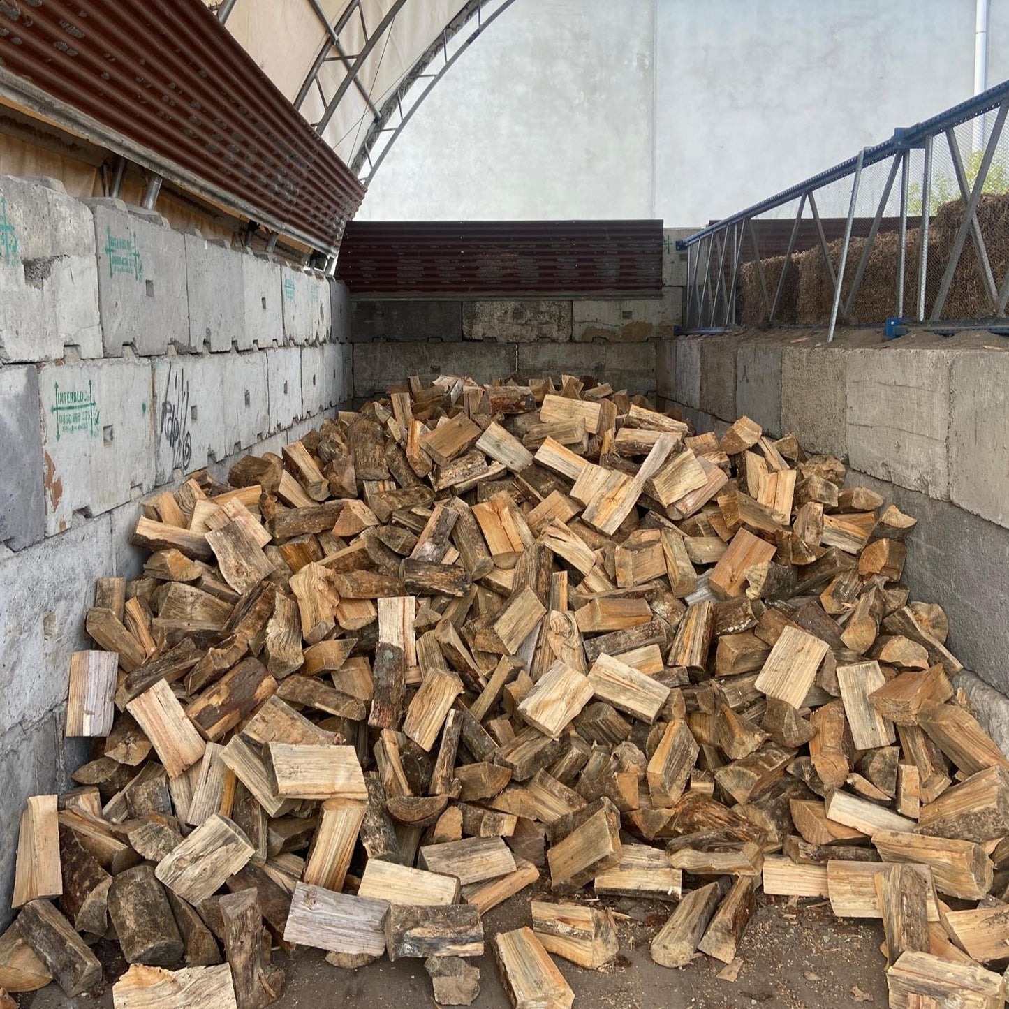 Dry Split Pine - under cover ready to burn